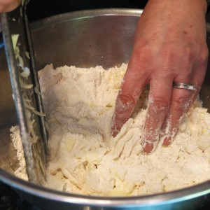 Mixing Frozen Butter Shreds into Flour for Pie Pastry
