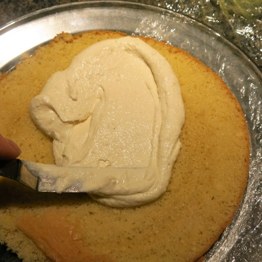 Spreading the Ricotta-Mascarpone Filling on each Layer of Sponge Cake
