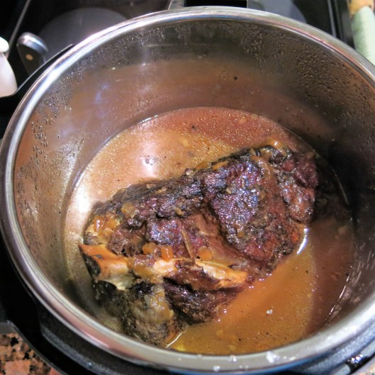 Island Spiced Pork Roast with Orange-Guava-Beer and Onion Sauce