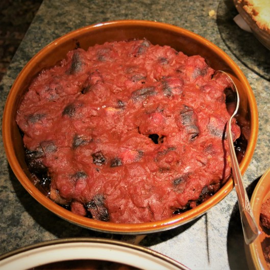 Bacon-Wrapped, Chorizo-Stuffed Dates in Red Pepper Sauce