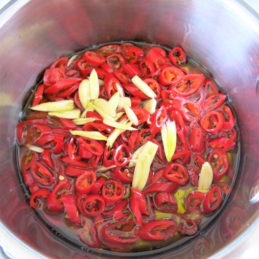 Oil to Cover the Hot Pepper Rings for Hot Pepper Rings in Olive Oil with Garlic