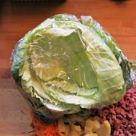 Cabbage Ready to be Nuked for Corned Beef-Potato Cabbage Rolls with Cider-Tomato Sauce