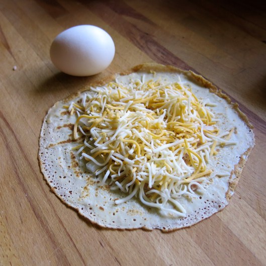 Ham & Cheese Filled Crêpe with an Egg Top Hat