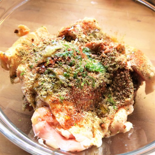 Seasoning the Jalapeño Popper-Stuffed Chicken Thighs