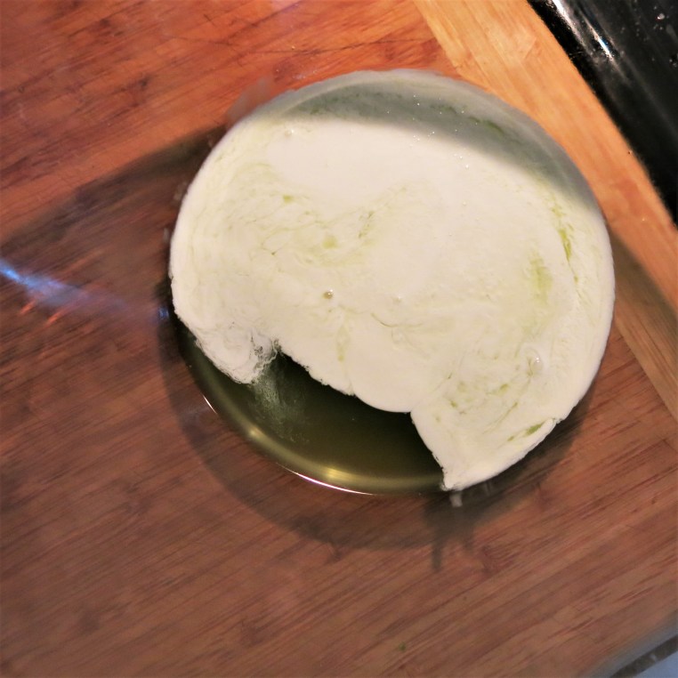 Zucchini Liquid and Heavy Cream for Creamed Spinach with Summer Squash and Corn Casserole