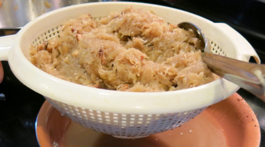 Draining Sauerkraut for Reuben Sandwiches