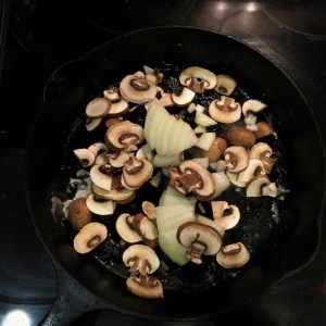 Skillet Pork Chops on a Bed of Onions and Mushrooms
