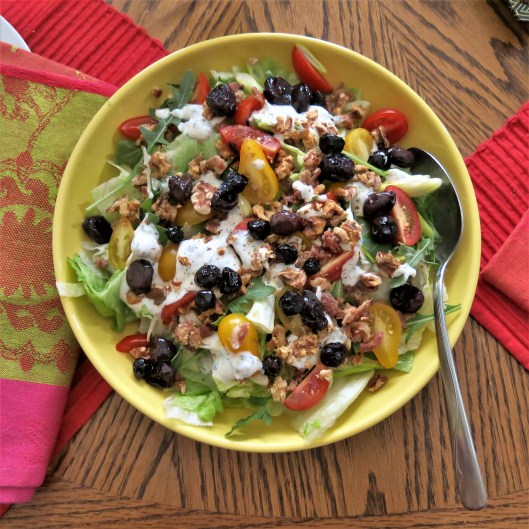 Salad Topped with Roasted Red Grapes with Blueberries